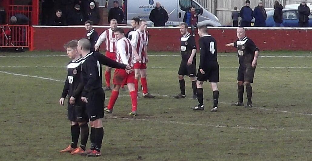 Thistle's Mark Canning, Graham Gracie and Alan Fleming take their places for a Jags free kick